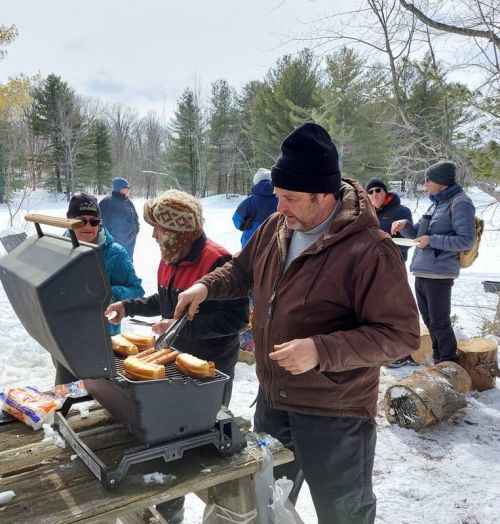 Richard Struthers and his team served up hot dogs and marshmallows at the 6th annual Sharbot Lake Wilderness Trails cookout.